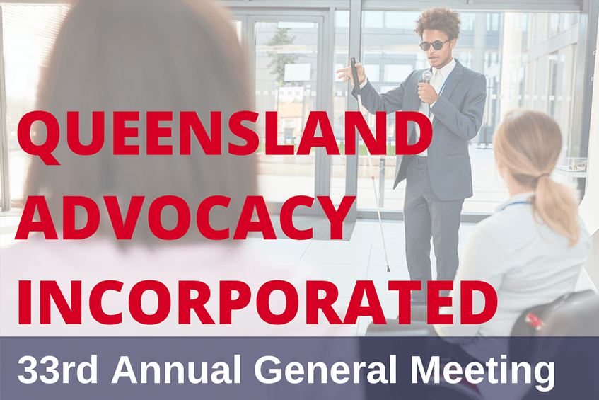 Photo of a meeting with text that says "Queensland Advocacy Incorporated 33rd Annual General Meeting"