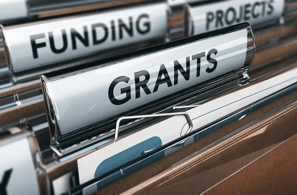 Close up photo of folders labelled Grants, Funding and Projects