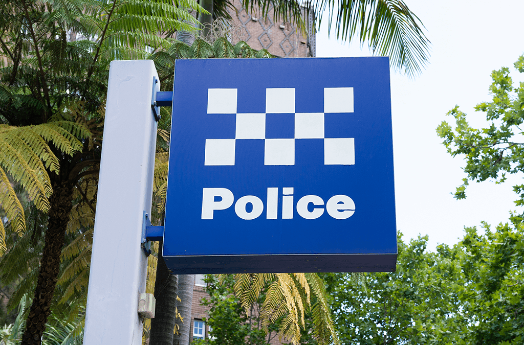 Photo of police station signpost